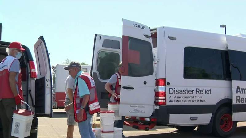 American Red Cross volunteers hand out clean-up kits across Metro Detroit