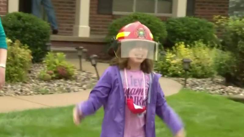Oakland County third grader rides to school in fire truck after raising money for fire department