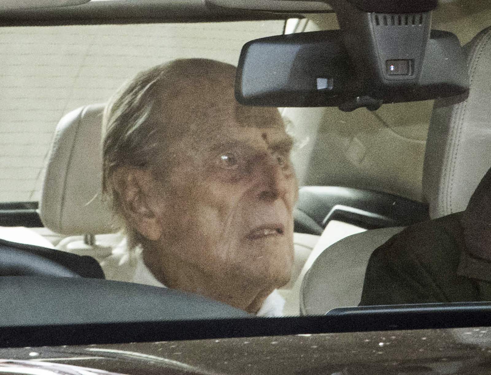 Britain's Prince Philip returns home after treatment