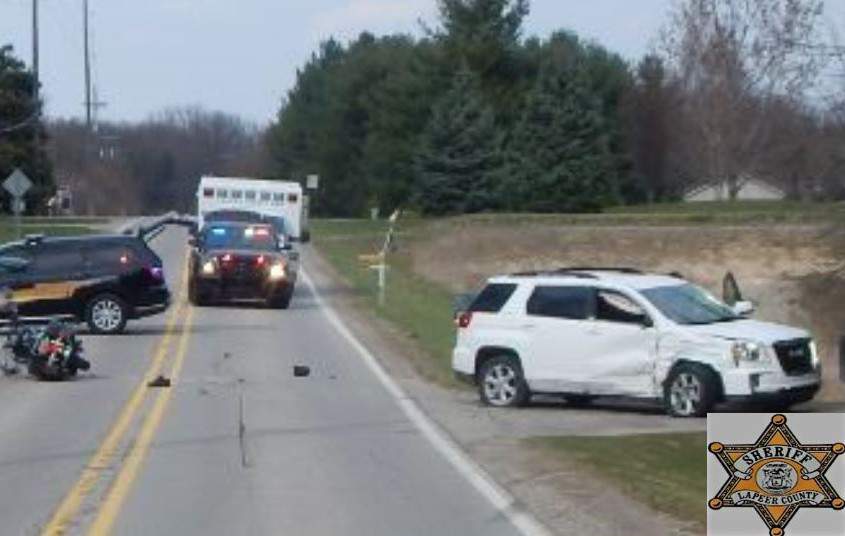 Man ejected from motorcycle, killed after crashing into SUV in Lapeer County