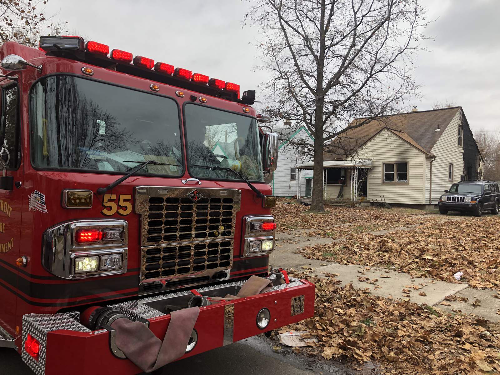 Detroit firefighters pull woman, young boy from house fire on Clayburn Street