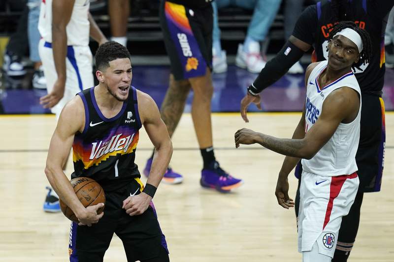Booker gets first triple-double, Suns beat Clippers 120-114