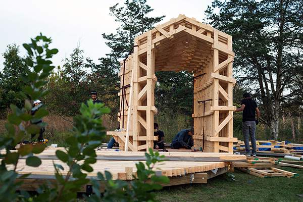 Robotically fabricated wooden pavilion on display at Matthaei Botanical Gardens in Ann Arbor