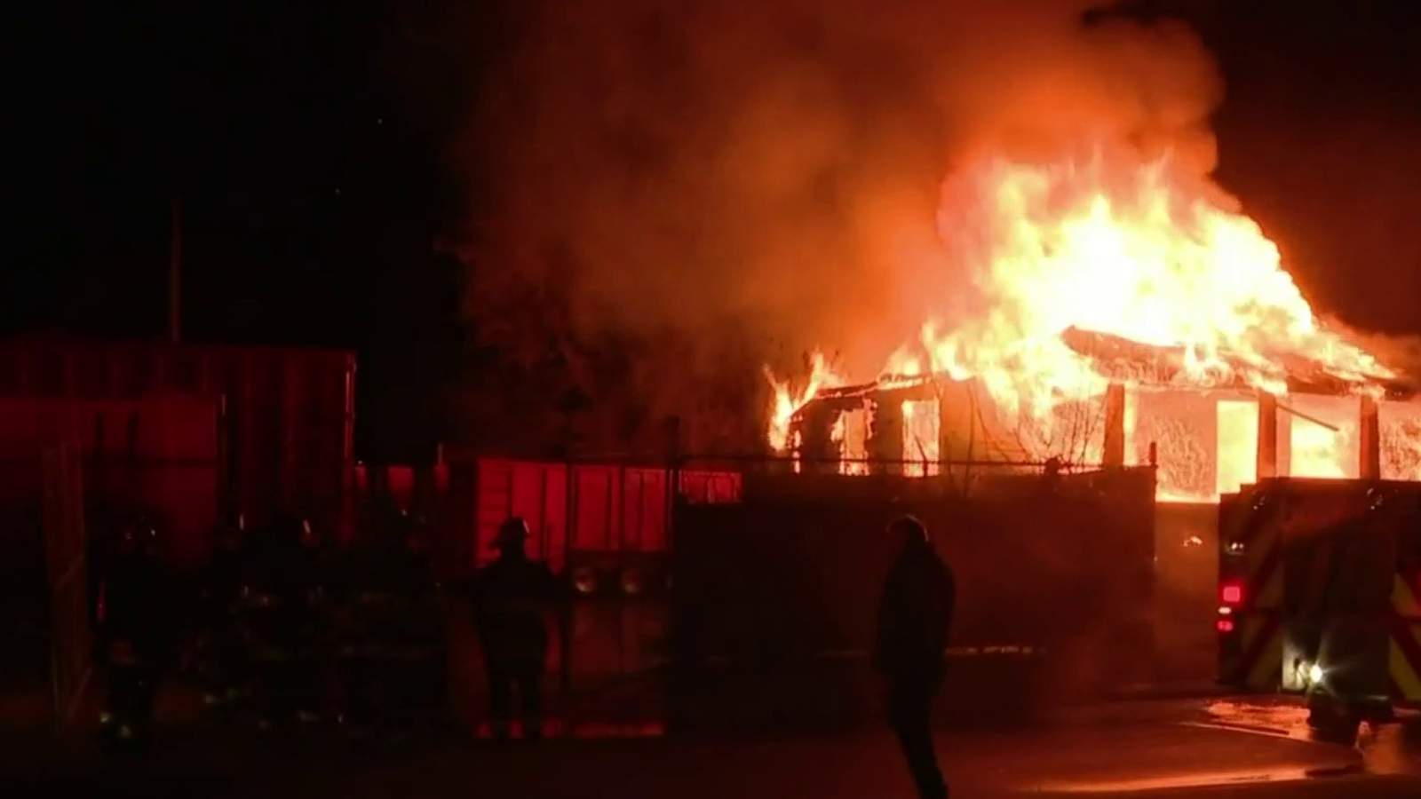 Firefighters work to keep flames away from Hamtramck business