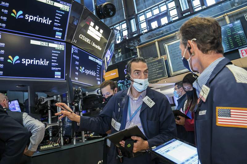 Stocks end listless day on Wall Street mixed as calm returns