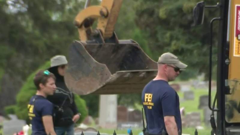 Authorities dig in Detroit cemetery to confirm burials