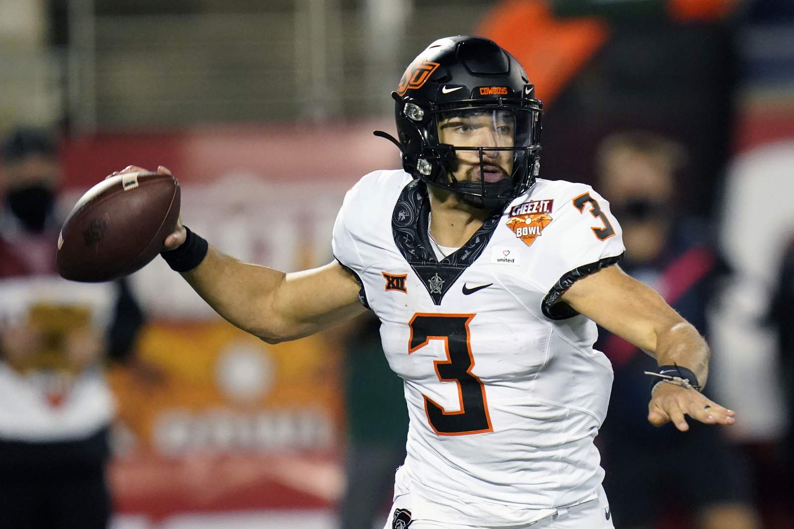 Sanders, Oklahoma State beat Miami 37-34 in Cheez-It Bowl