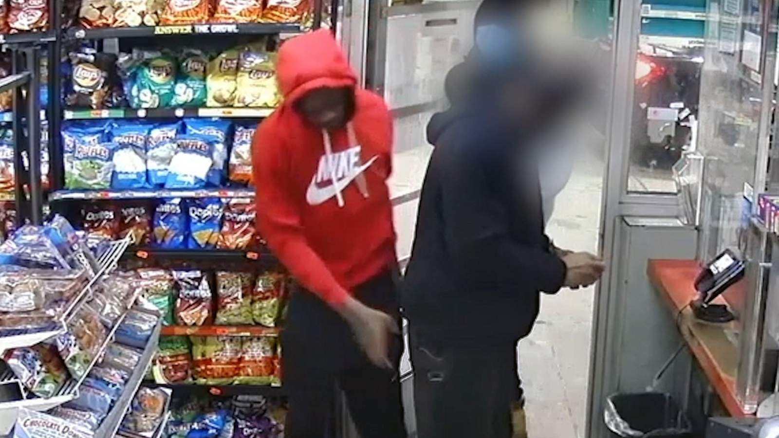VIDEO: Man snatches gun from man at Detroit gas station counter