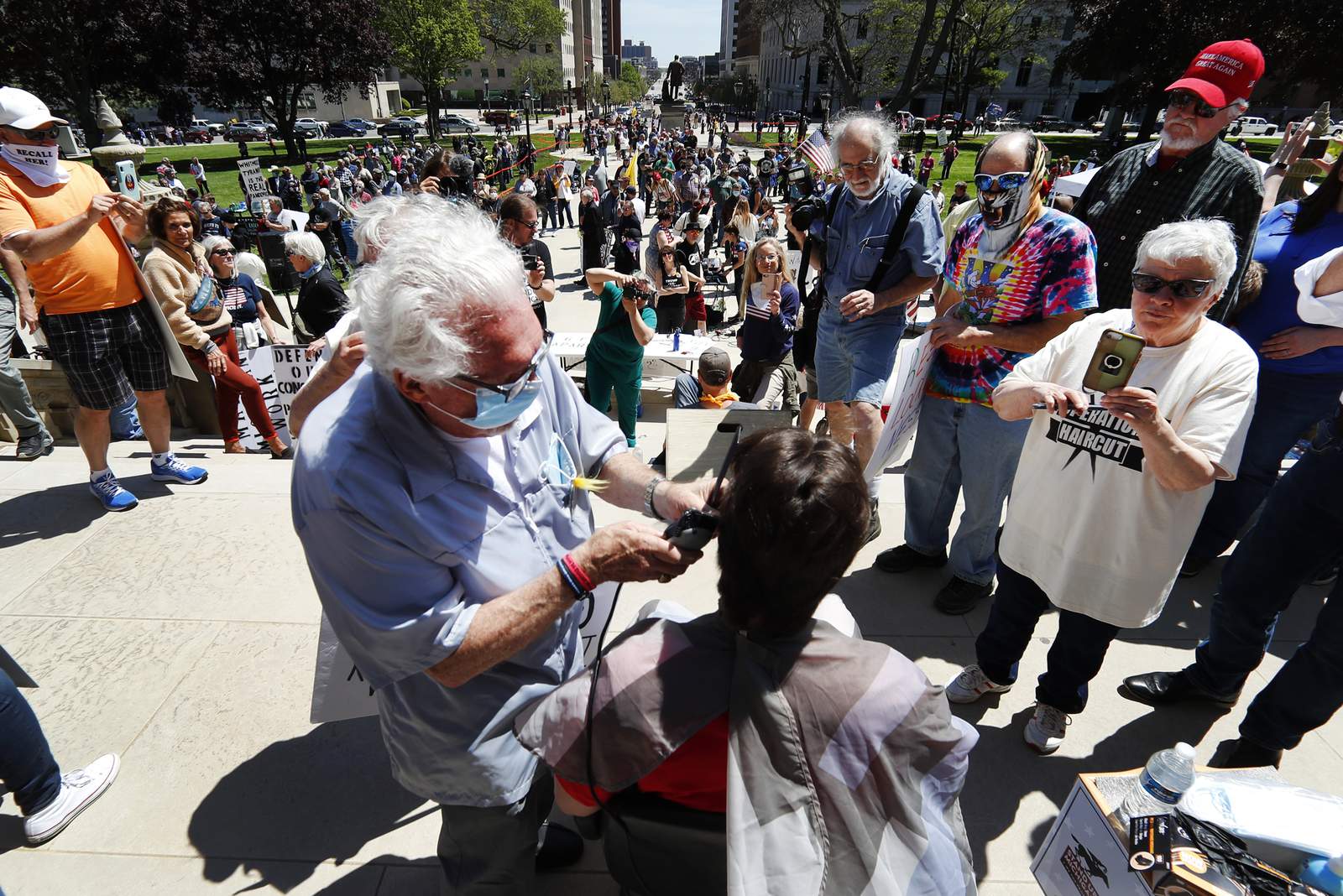 Michigan fines barber over Capitol protest, other violations