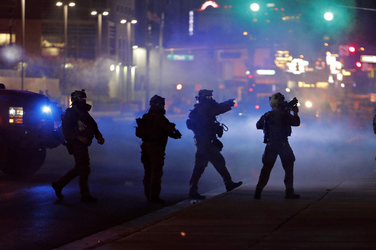 Videos show police turning up heat on protesters, rioters across US cities