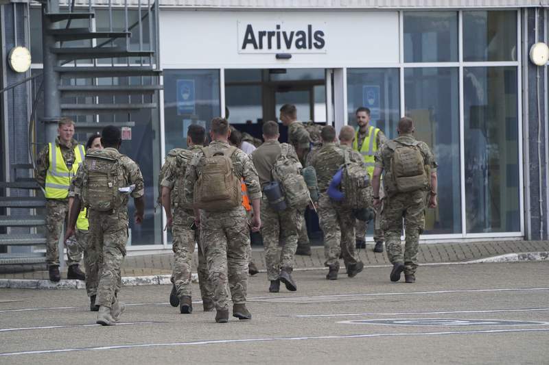 As troops return, UK under pressure over Afghans left behind