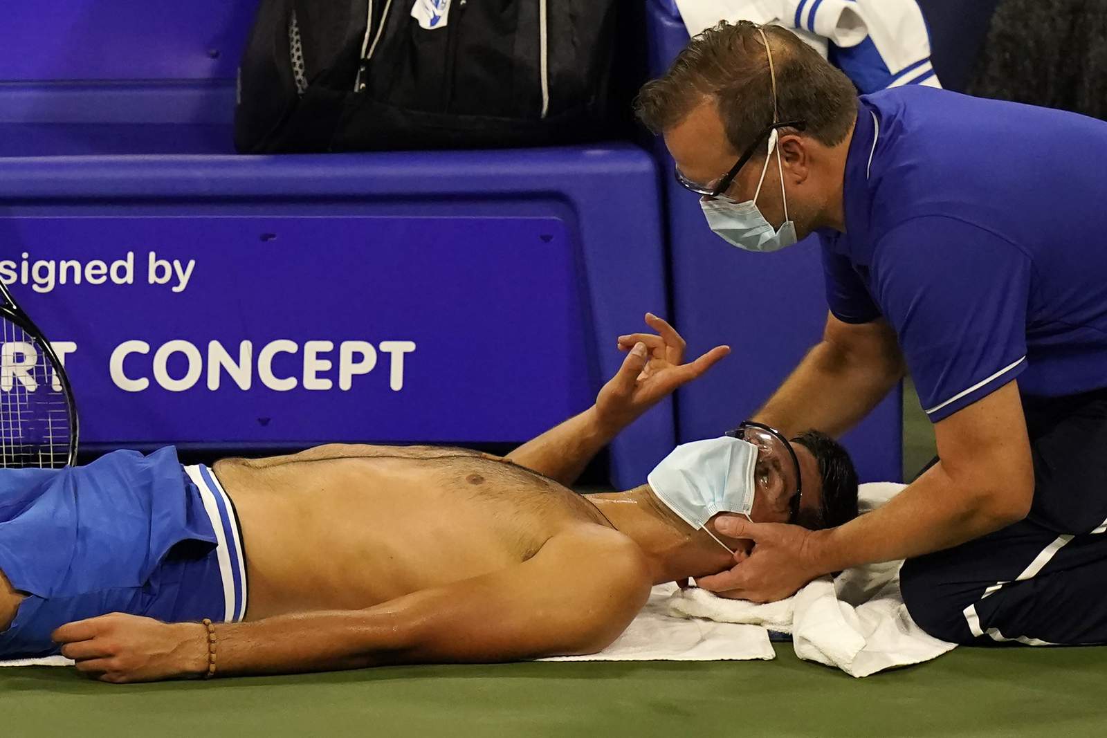 Pain in the neck: Djokovic gets by in 1st post-hiatus match