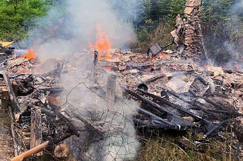 Offers flooding in after woodland hermit's cabin burns down