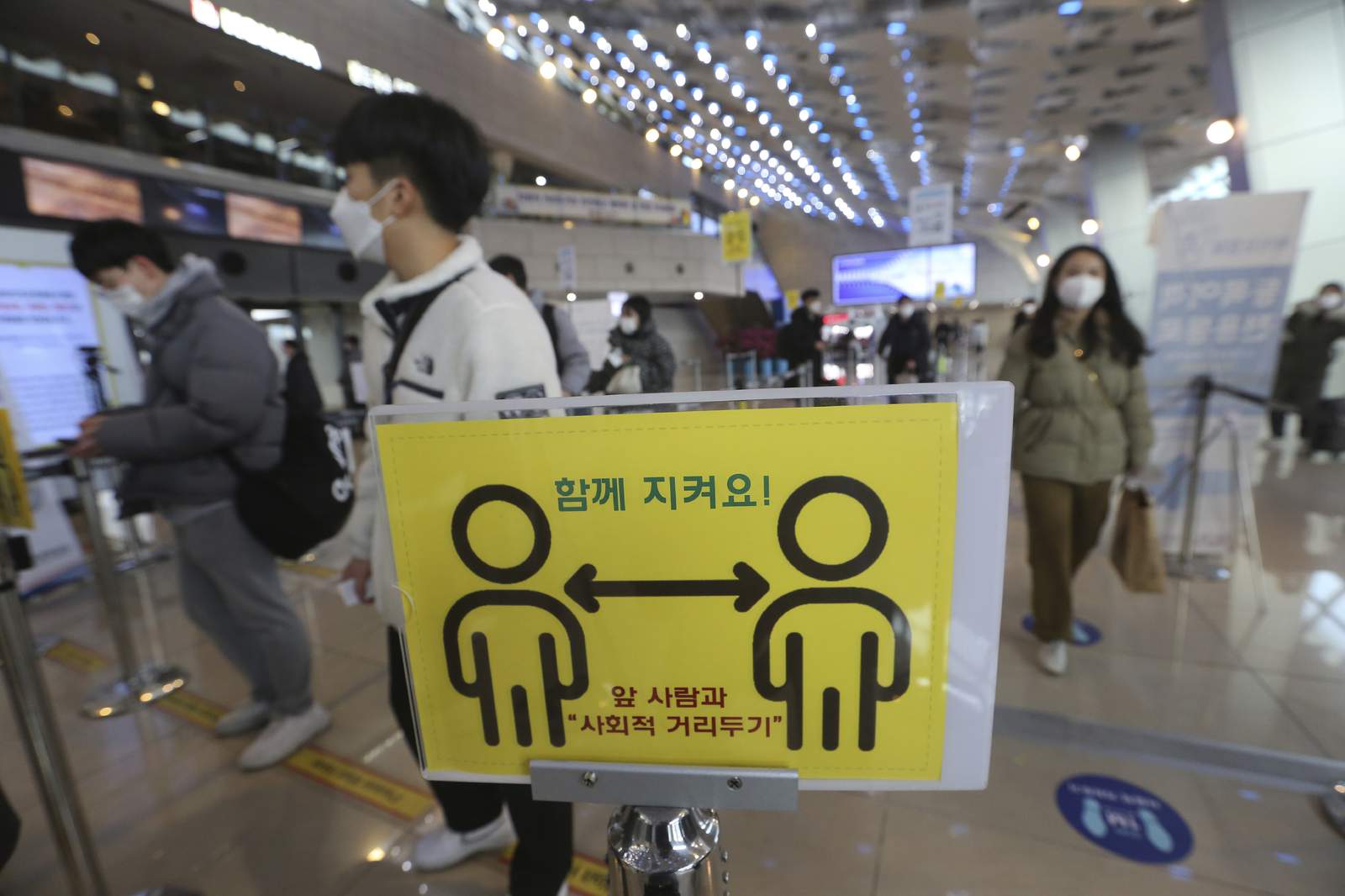 The Latest: Jump in cases worries S. Korea as holiday starts