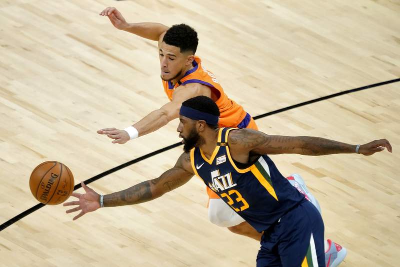 Suns beat Jazz 121-100, now tied for NBA's best record