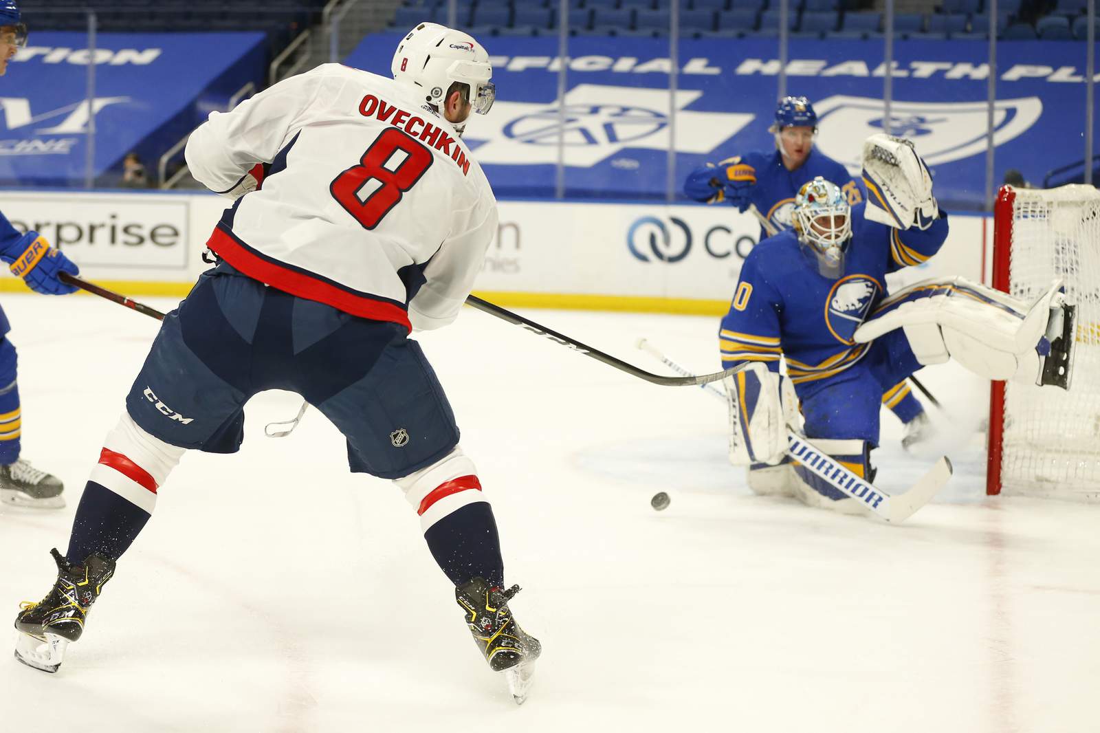 Ovechkin matches Esposito with 717th goal; Caps rout Sabres