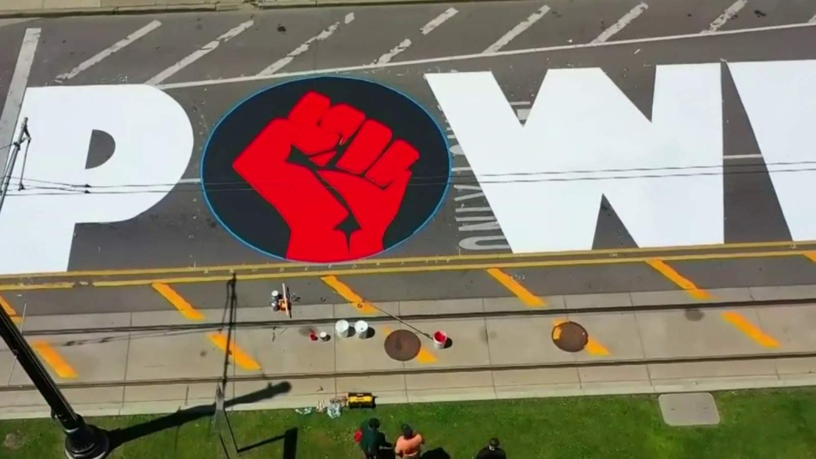 Students complete Juneteenth street mural along Woodward in Detroit