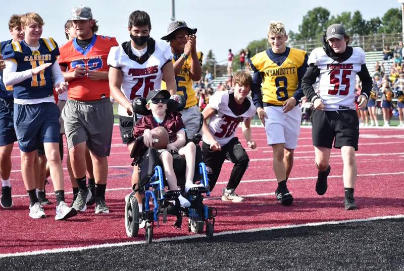 Victory Day brings football game day experience Downriver to children with special needs
