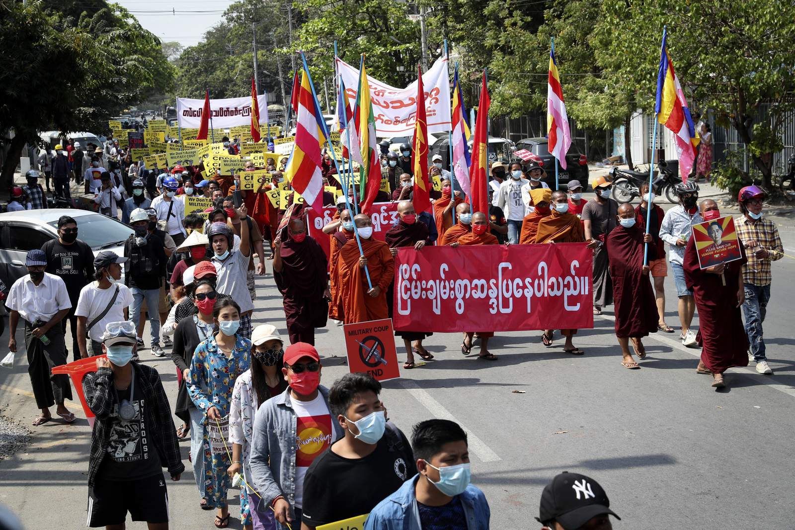Defying deadly crackdown, crowds again protest Myanmar coup