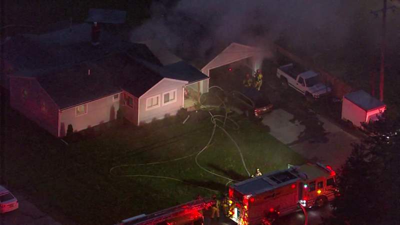 Family of 9 able to escape Troy house fire