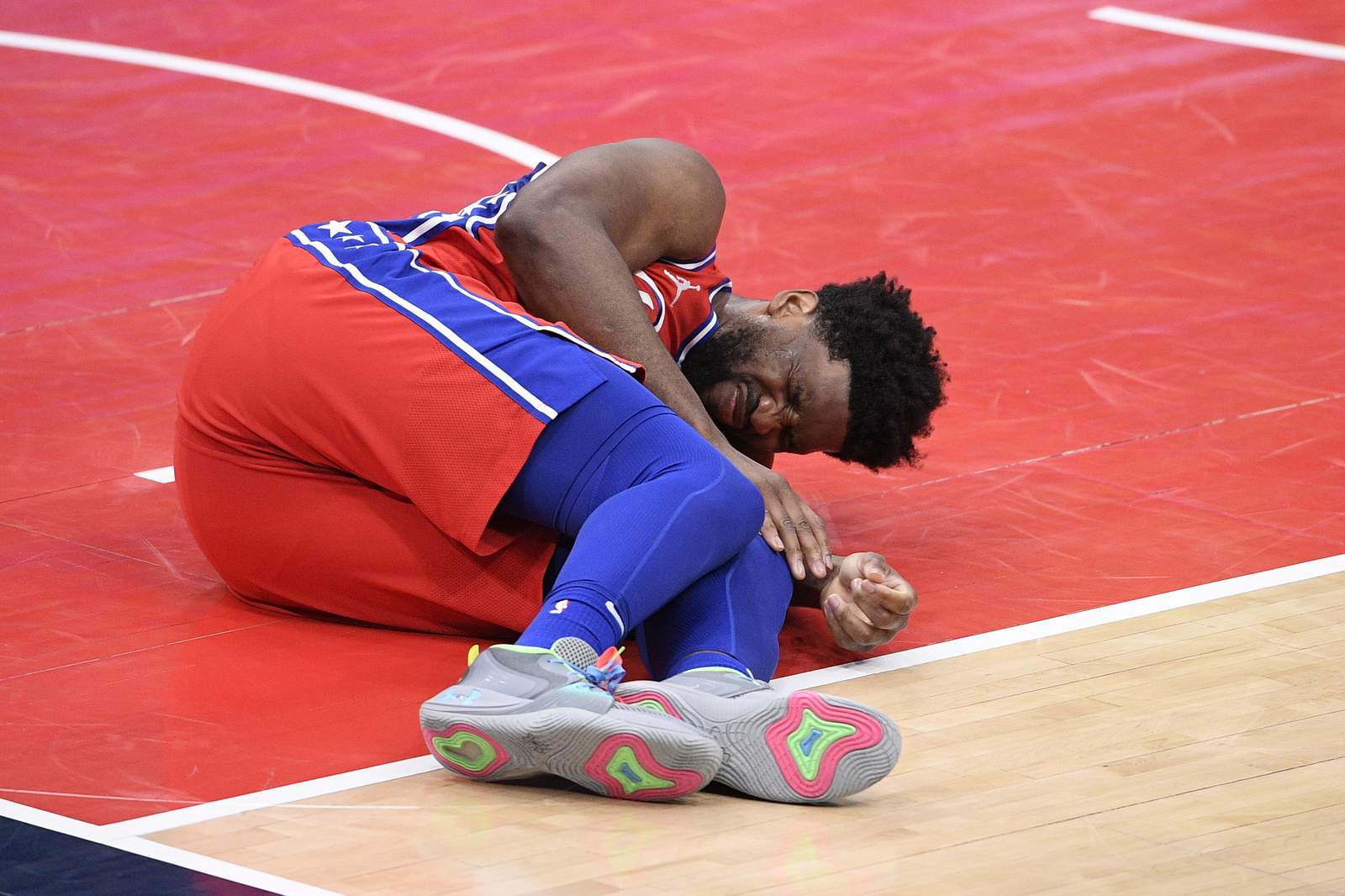 AP source: Embiid sidelined with bone bruise in left knee