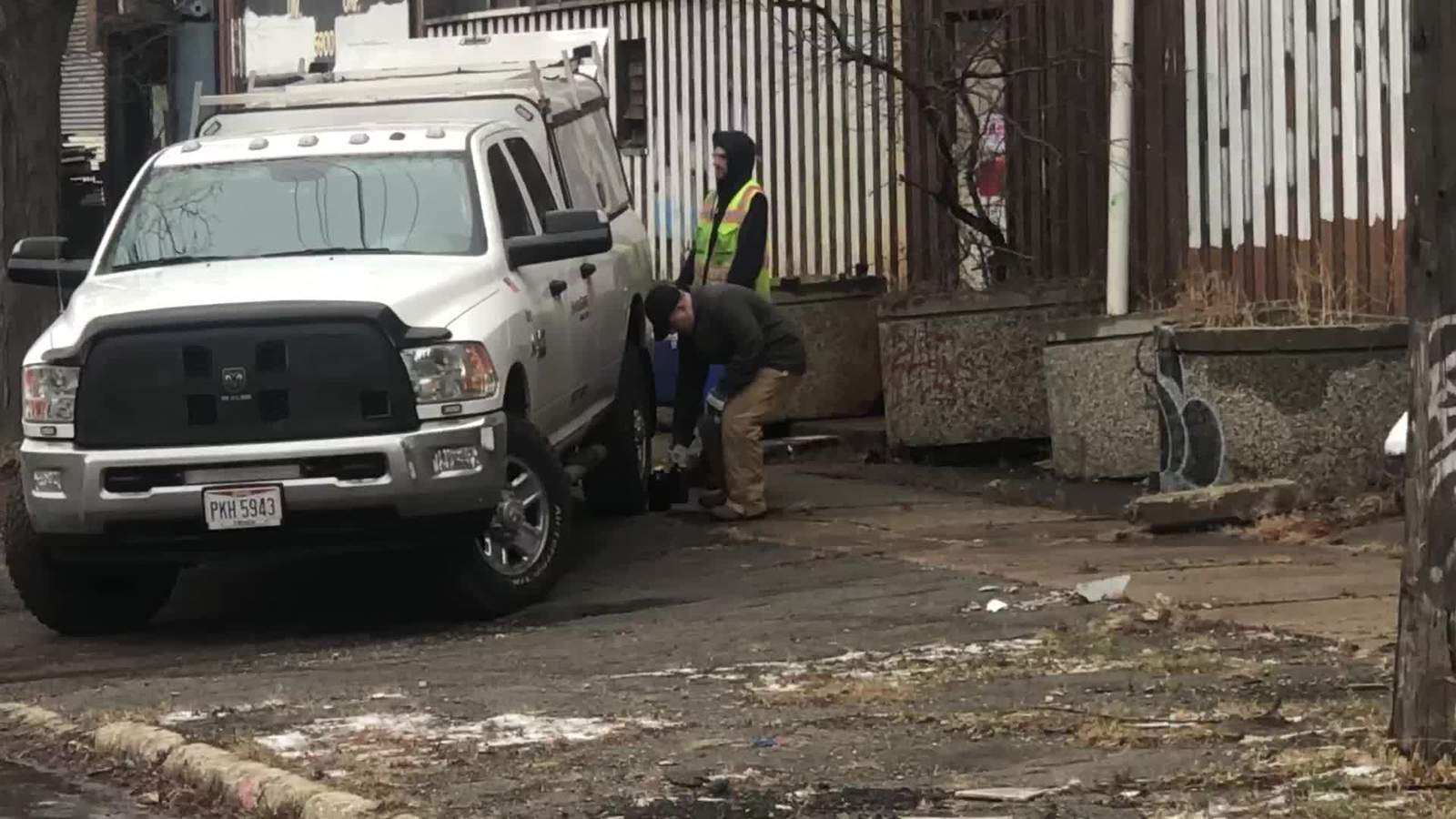 New video shows officials removing samples of potentially hazardous liquid from Detroit building