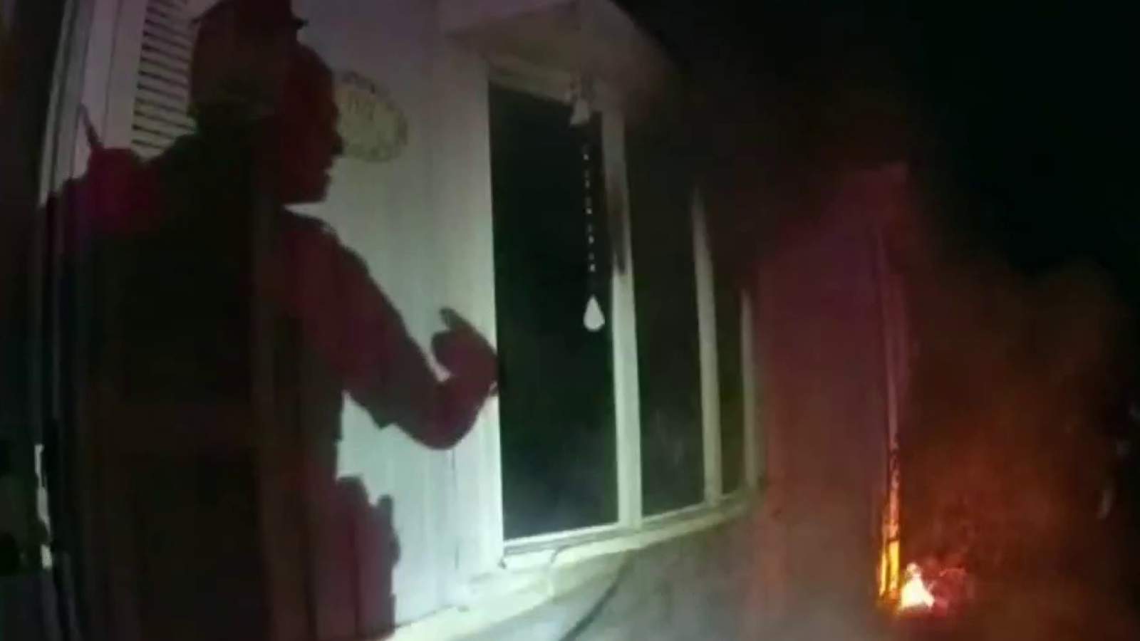 Video: Police pull 74-year-old woman out of burning house in Royal Oak