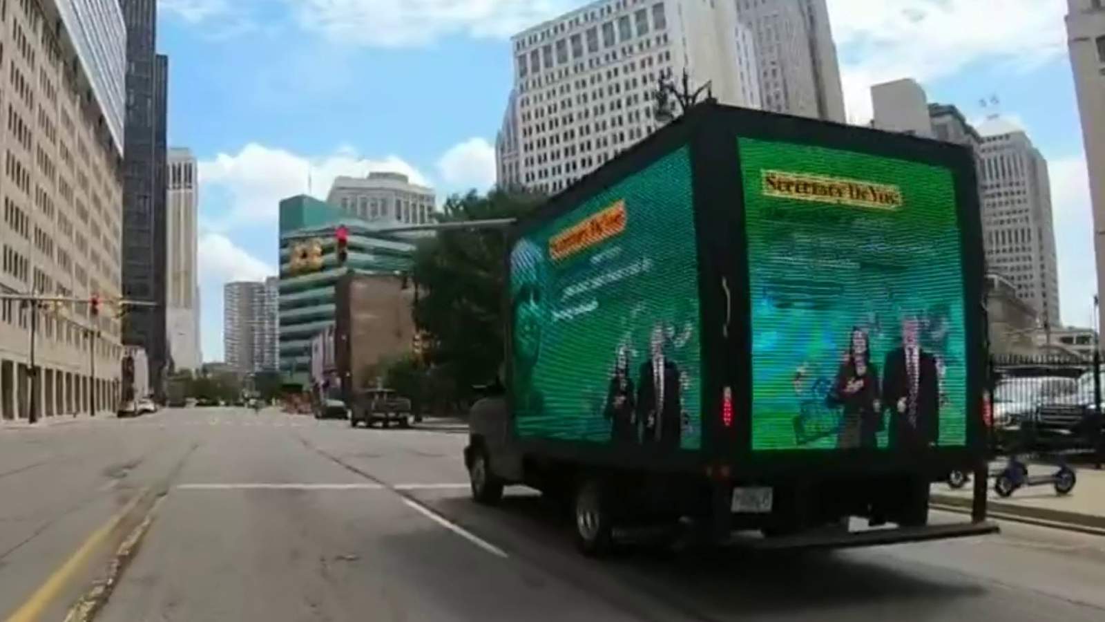 Mobile billboard spotted in Detroit slams Betsy DeVos over school reopening plans
