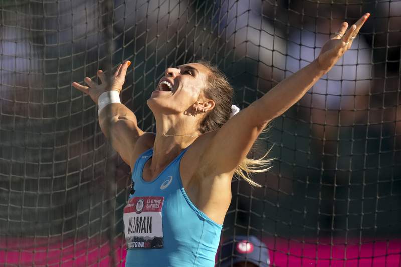 The Latest: Allman wins discus, earns spot at Tokyo Games