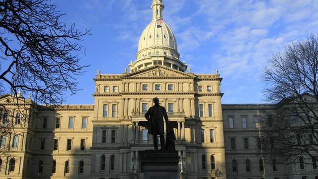 Michigan budget boosts child care, keeps pay hike for caregivers; Deal limits vaccine mandates
