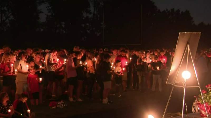 Community vigil honors 3 friends who died at Michigan’s Faster Horses Festival