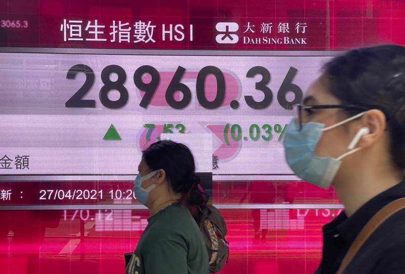 Asia stocks lower after Wall St record ahead of Fed meeting