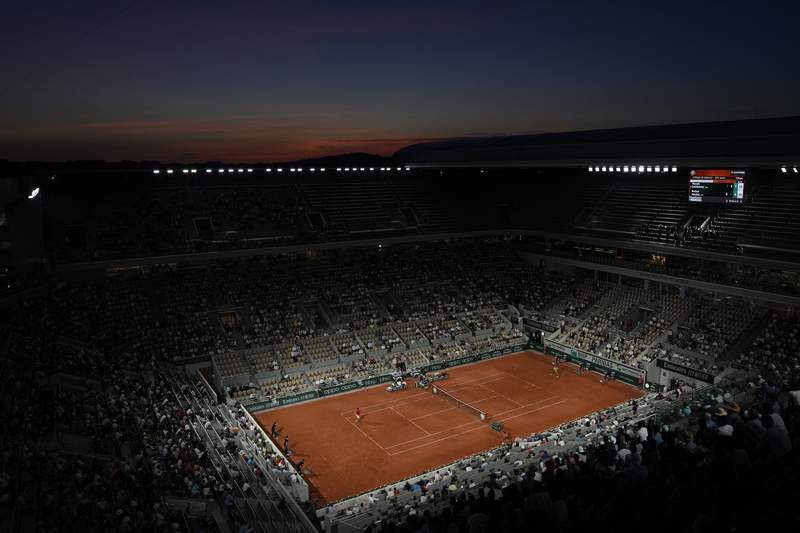 The Latest: French Open lifts curfew for Djokovic vs Nadal