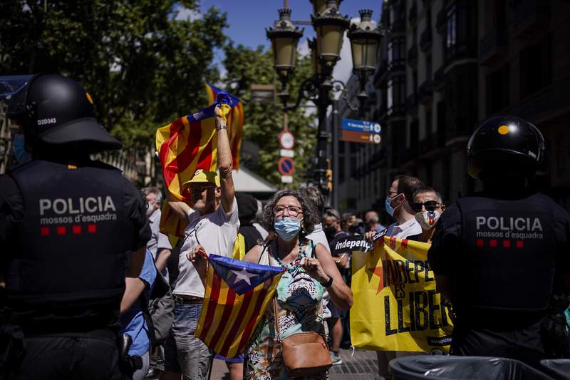 AP EXPLAINS: Why has Spain pardoned 9 Catalan separatists?