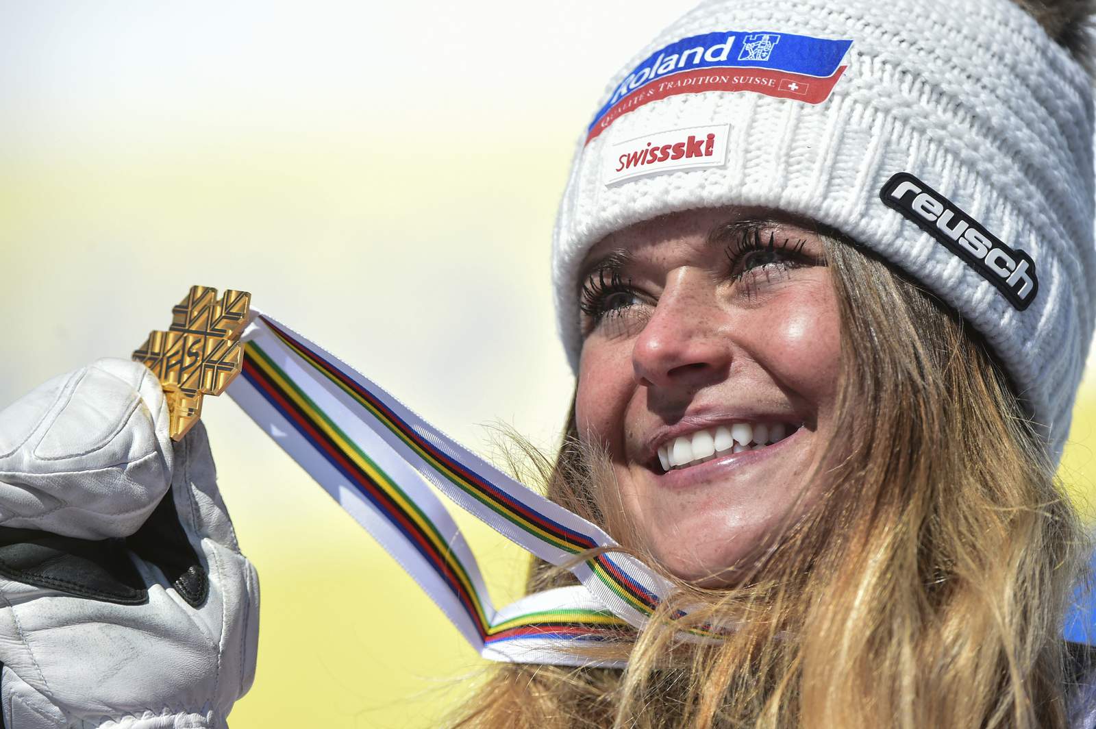 Riding high: Suter wins downhill for her 1st gold at worlds