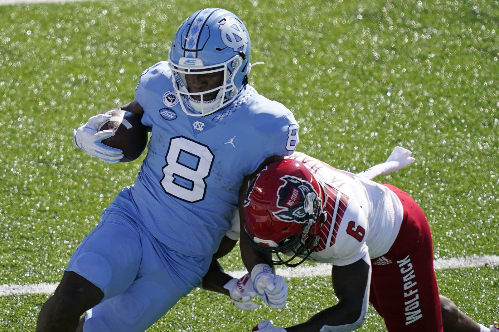 Williams, Carter lead No. 14 UNC past No. 23 NC State 48-21