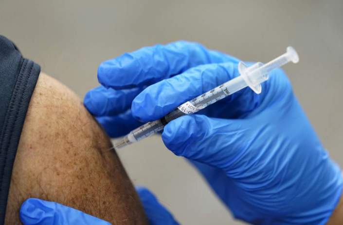 Online ‘backdoor’ used by 2,700 to schedule vaccinations in Michigan