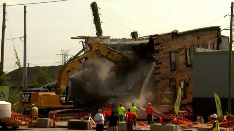Crews demolish building at site of road buckling in southwest Detroit
