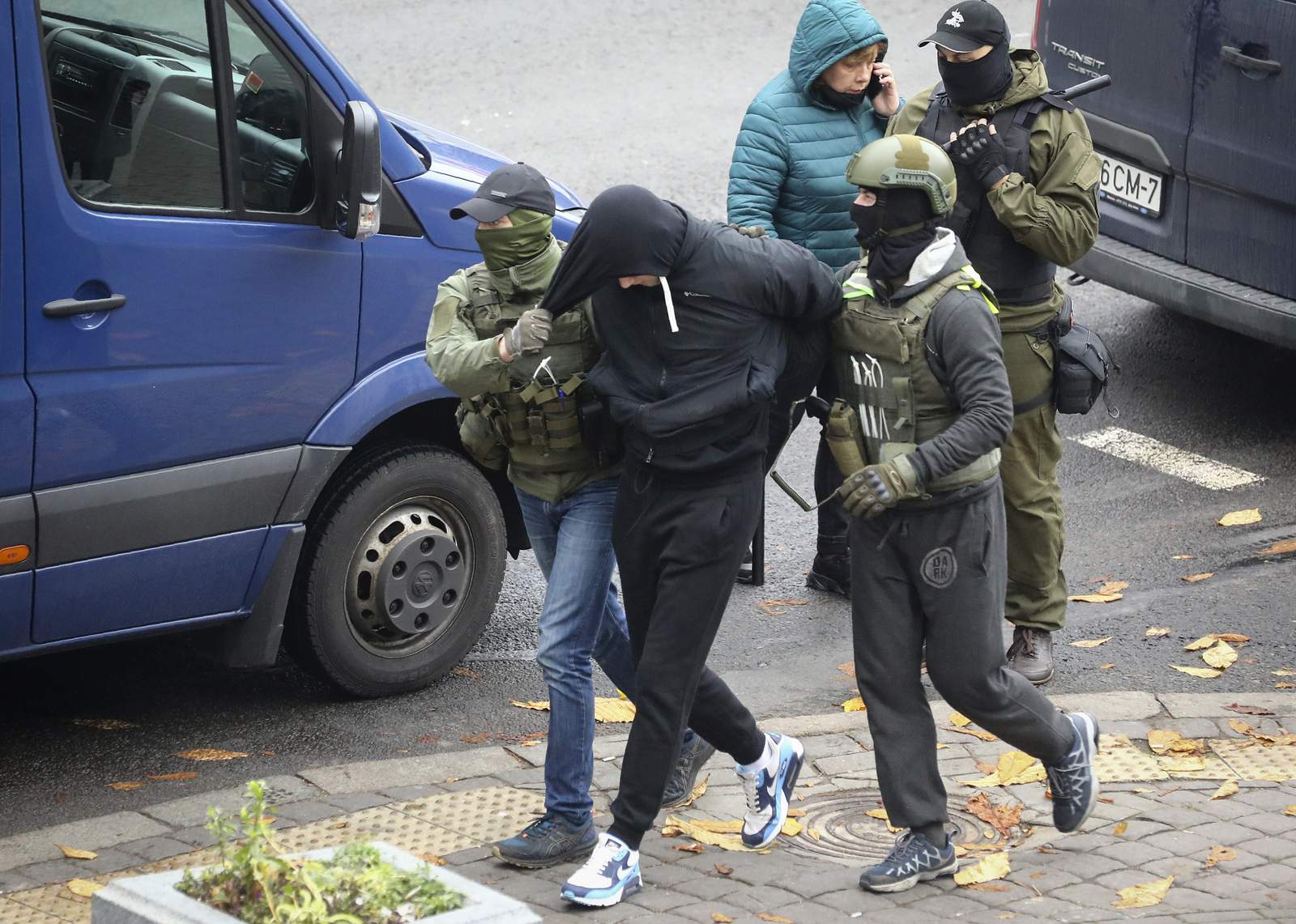 Club-wielding police in Belarus arrest nearly 400 protesters