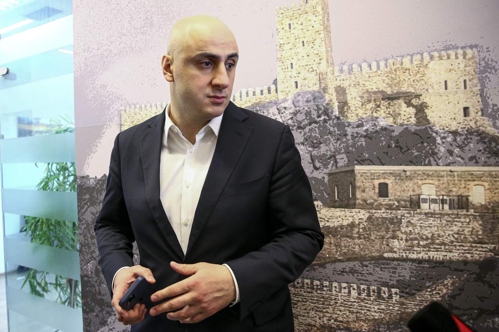 Georgian opposition leader arrested, protesters set up camp