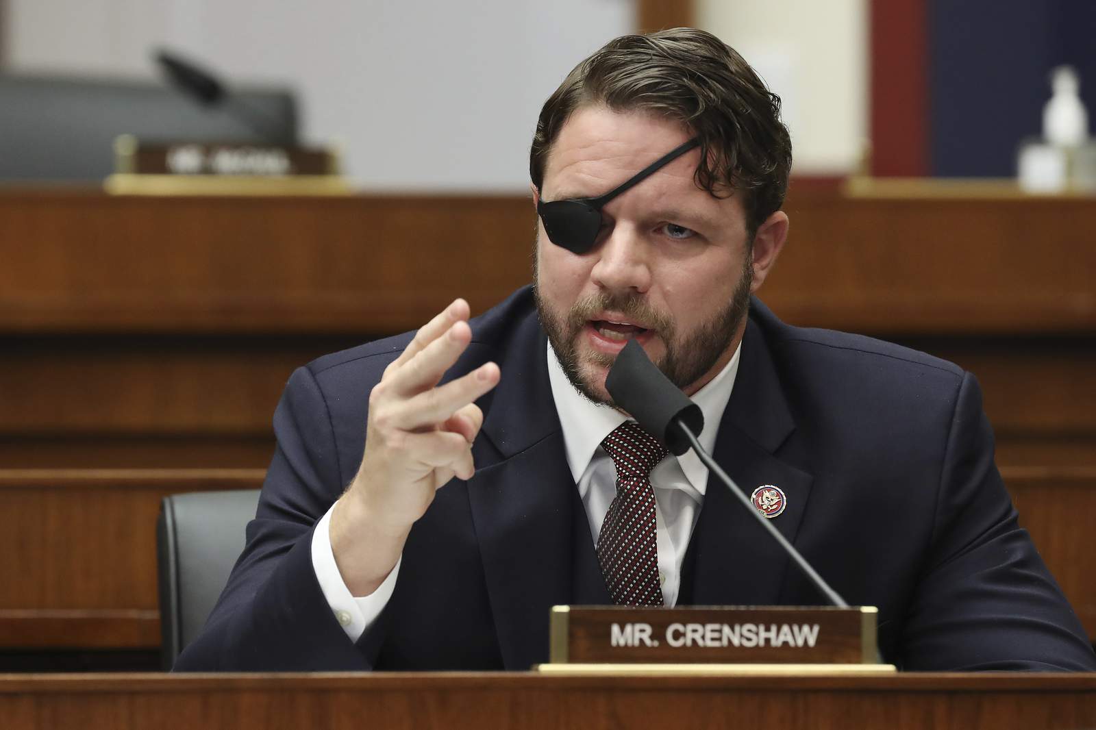 Texas Rep. Crenshaw temporarily blinded after eye surgery