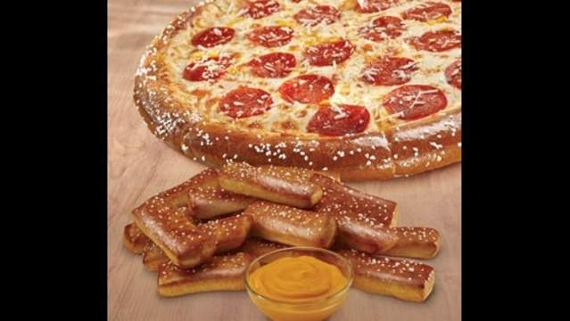 Little Caesars Brings Back Pretzel Crust Adds Pretzel Dippers